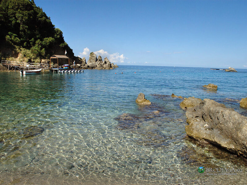 Rocky Cove with Clear Water — Blue