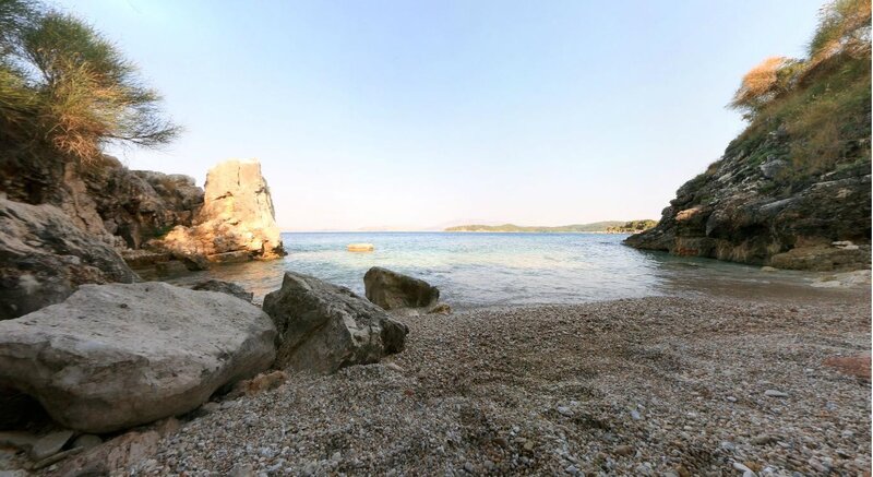 rocky cove with pebble beach