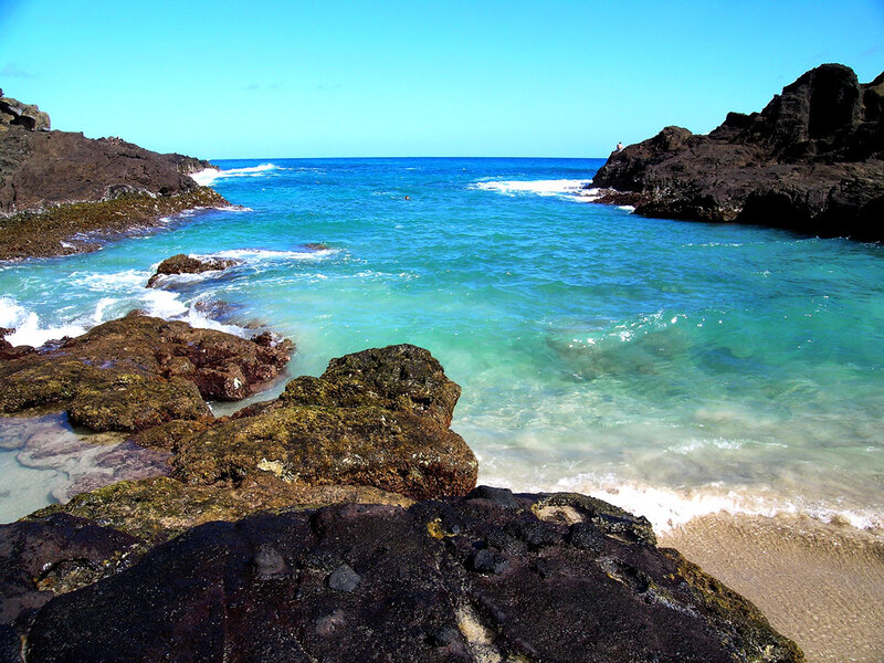 rocky cove with turquoise water
