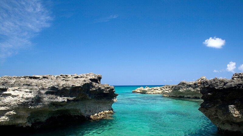 Rocky Cove with Turquoise Water — Blue, Serene