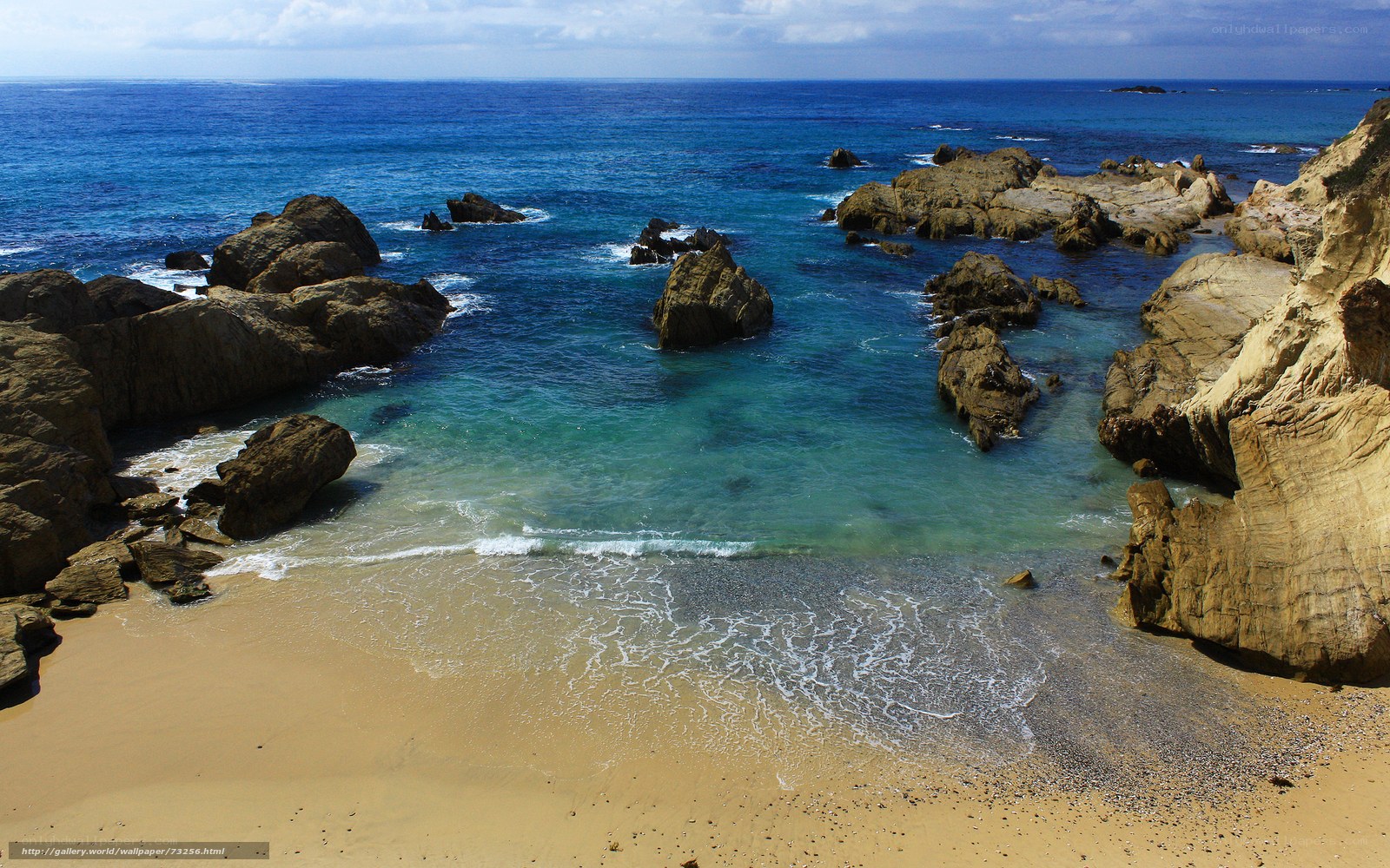 rocky cove with turquoise water