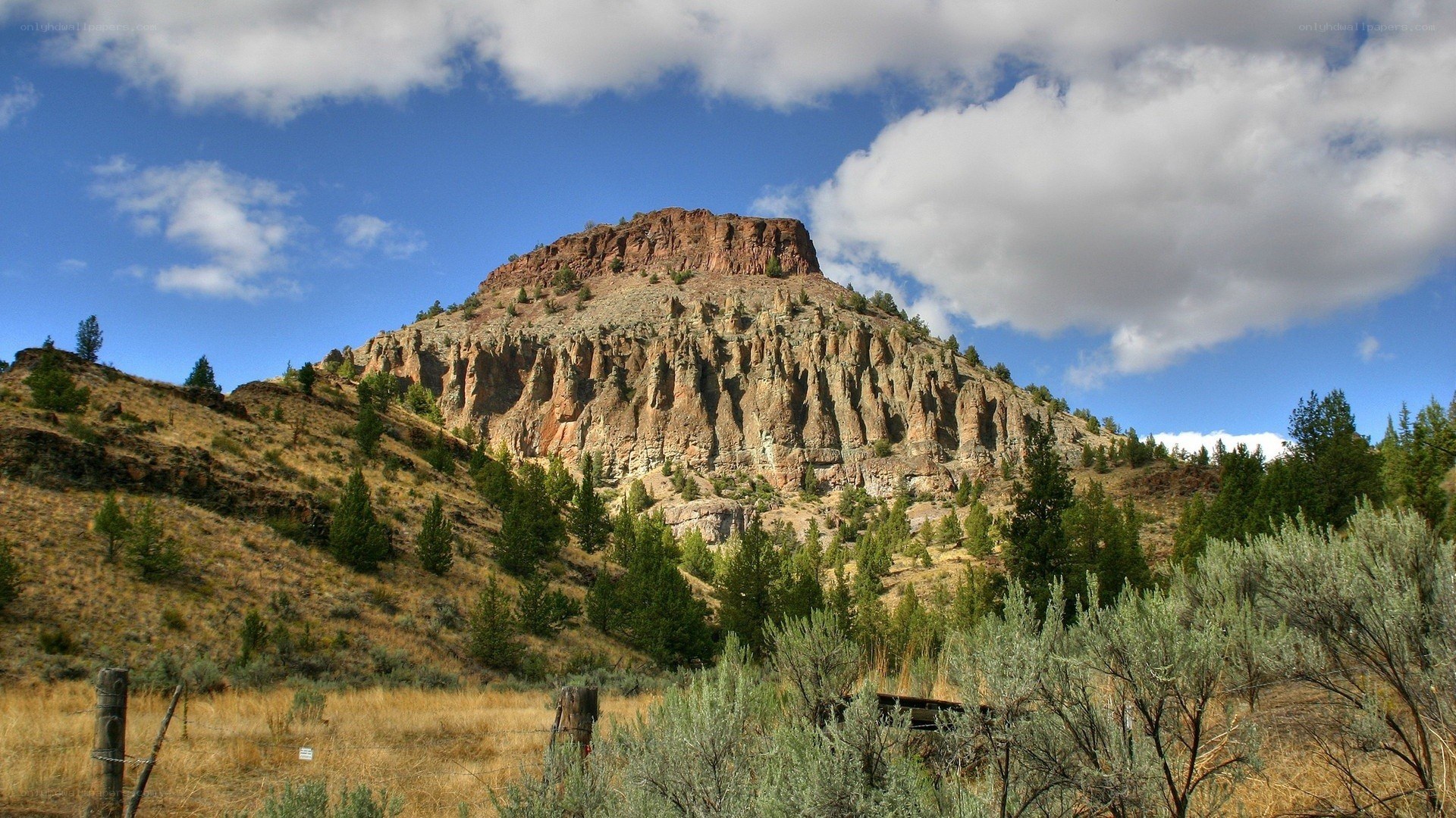 Rocky hill under blue sky