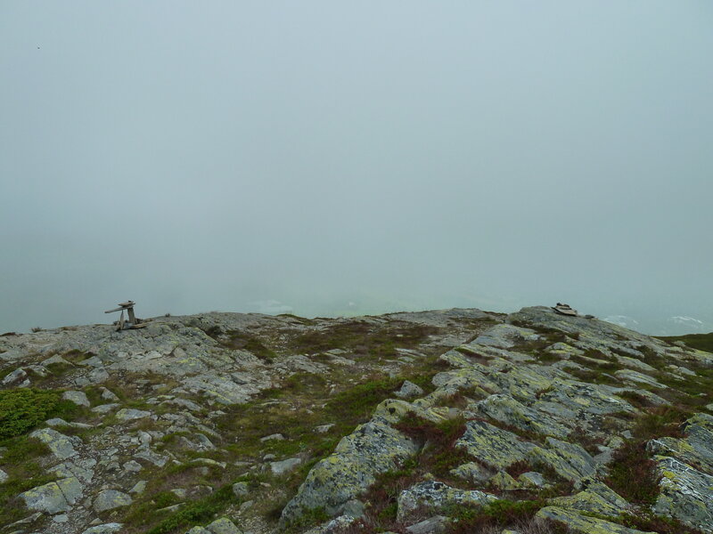 Rocky Hilltop with Cairns