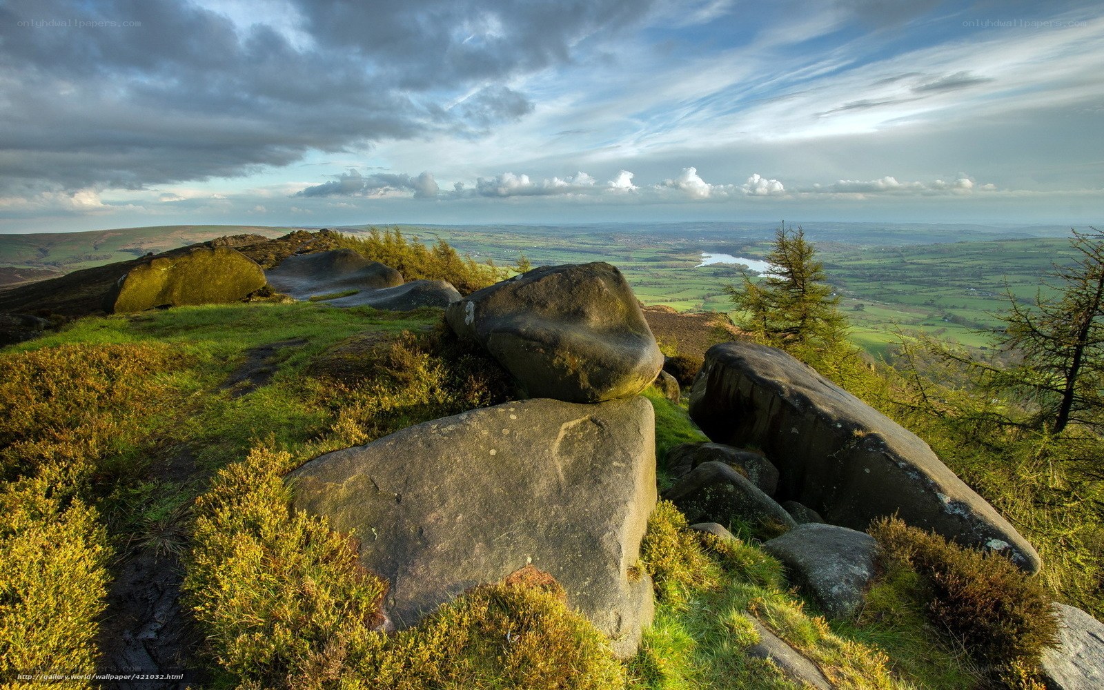 Rocky hilltop with valley view