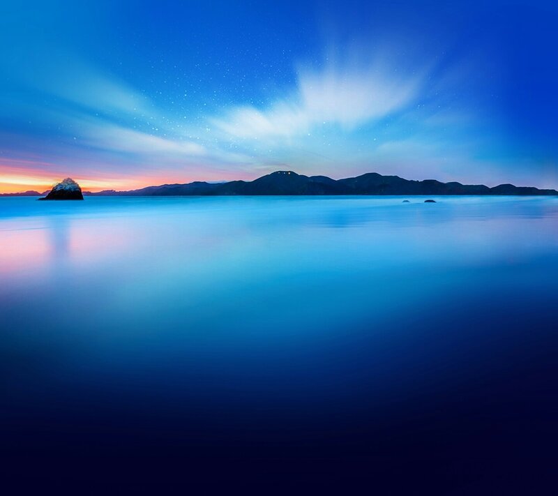 Rocky Island at Sunset — Blue, Serene, Photograph, Mountains, Sky