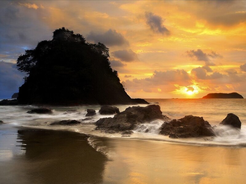 Rocky Island at Sunset — Orange, Serene, Photograph, Ocean, Sky