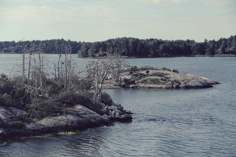 Rocky island in a calm lake