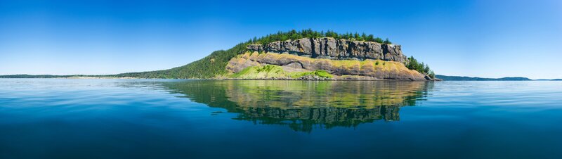 Rocky Island in Calm Water