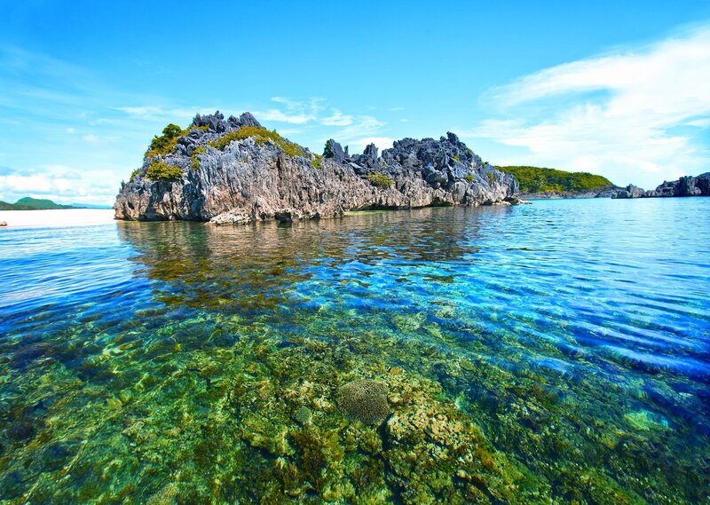 Rocky Island in Clear Water