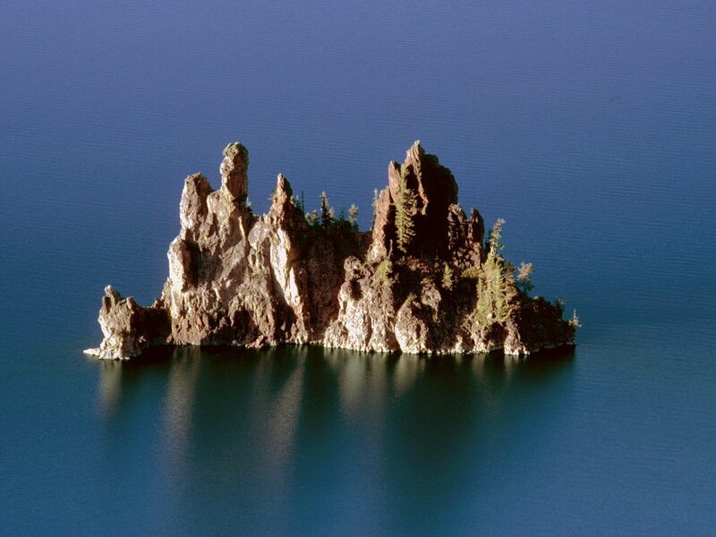Rocky Island in Lake — Blue, Serene, Afternoon, Photograph, Trees, Rocks