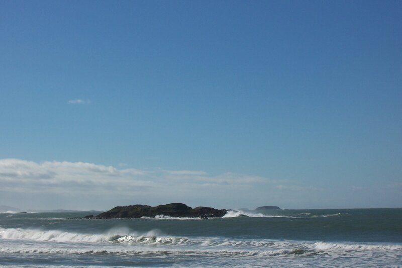Rocky Island in Ocean — Blue, Calm