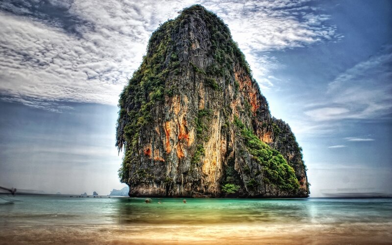 Rocky Island in Ocean — Blue, Dramatic, Photograph, Sky