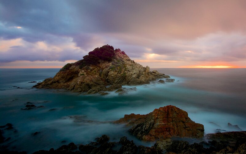 Rocky Island in Ocean — Blue, Dramatic, Sunset, Photograph, Sky