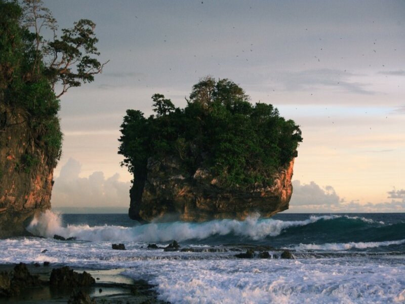 Rocky Island in Ocean — Blue, Dramatic, Sunset, Photograph