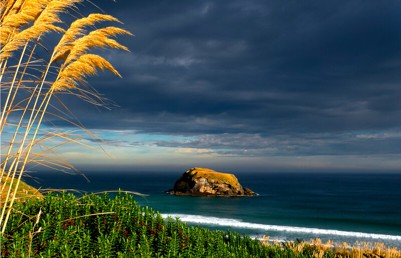 Rocky Island in Ocean — Blue, Dramatic, Sunset