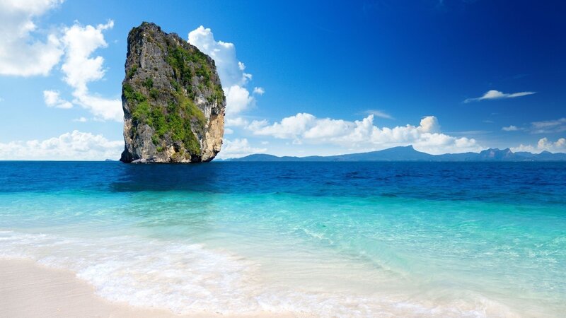 Rocky Island in Ocean — Blue, Serene, Afternoon, Photograph, Sky, Beach