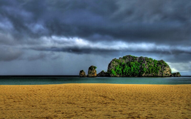 Rocky Island in Ocean — Brown, Dramatic