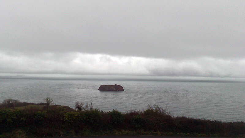 Rocky Island in Sea — Gray, Overcast