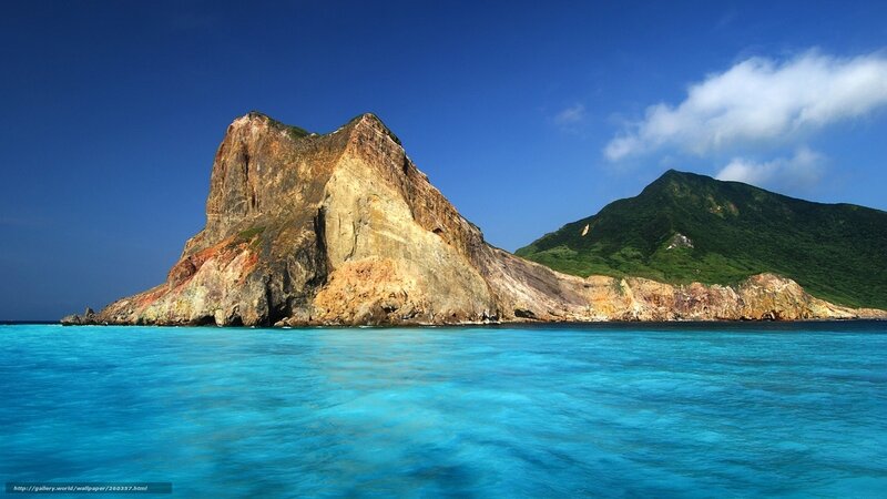 Rocky island in turquoise water