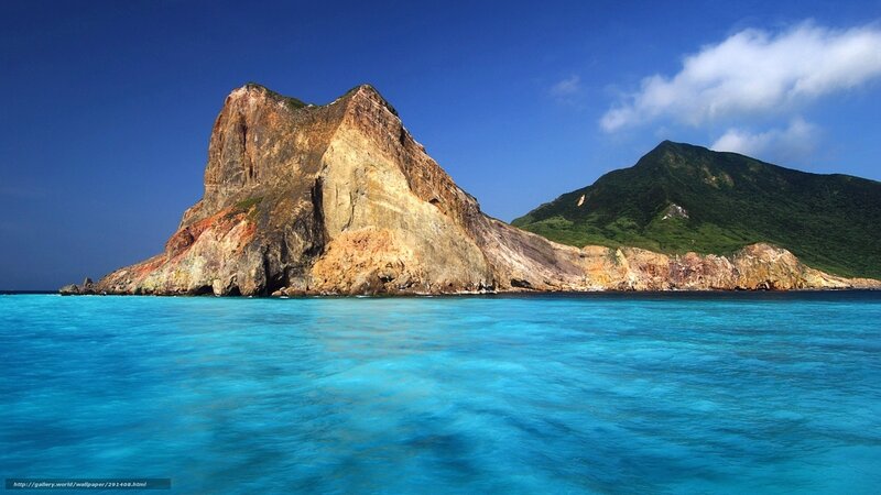Rocky island in turquoise water