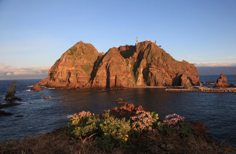 Rocky Island with Lighthouse — Blue