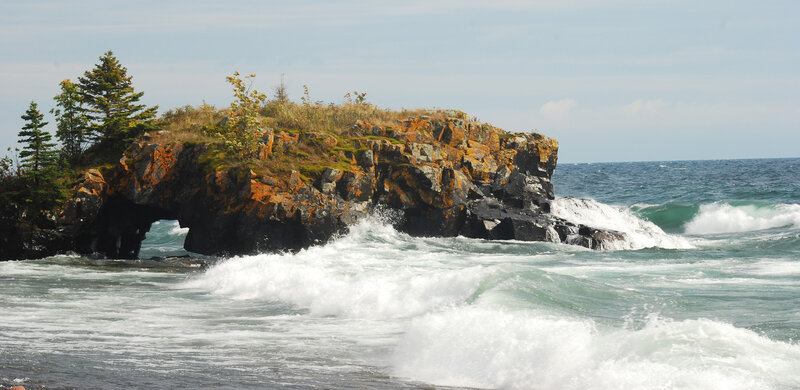 Rocky Island with Sea Waves