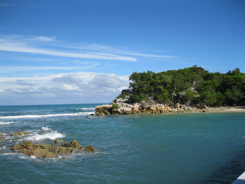 Rocky Island with Trees — Blue, Serene, Afternoon, Photograph, Ocean, Sky