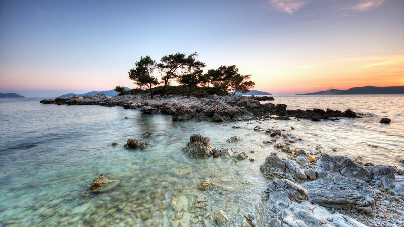 Rocky Island with Trees — Blue, Serene, Sunset