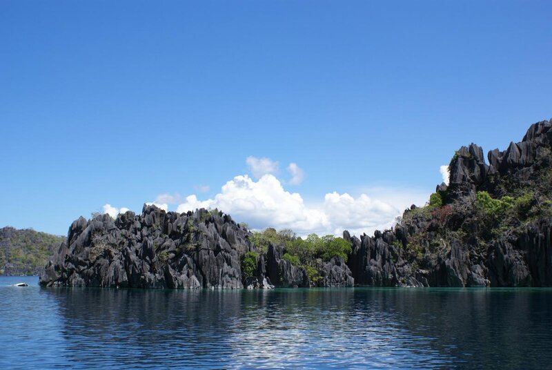 rocky islands in turquoise water