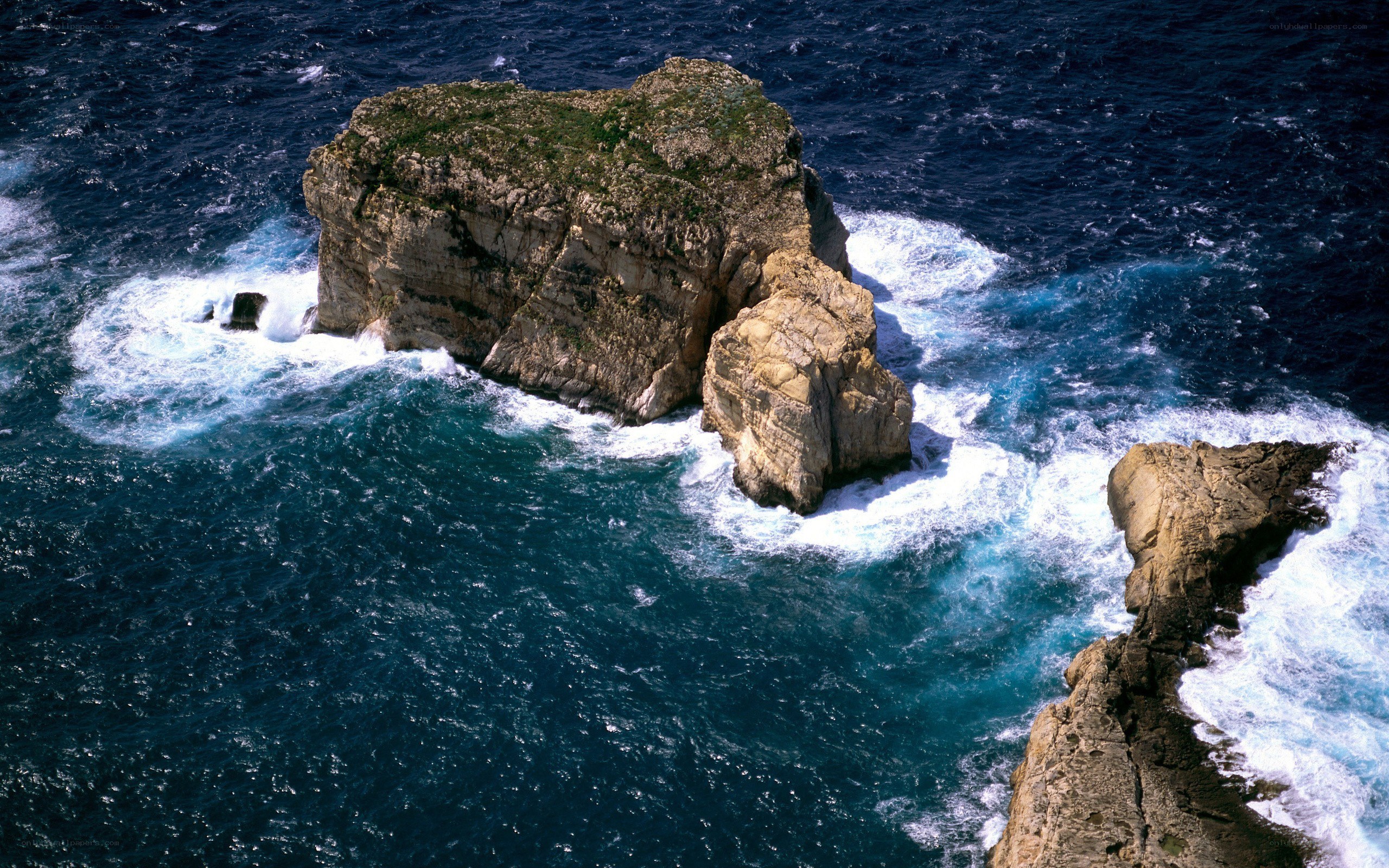 Rocky islet in the ocean