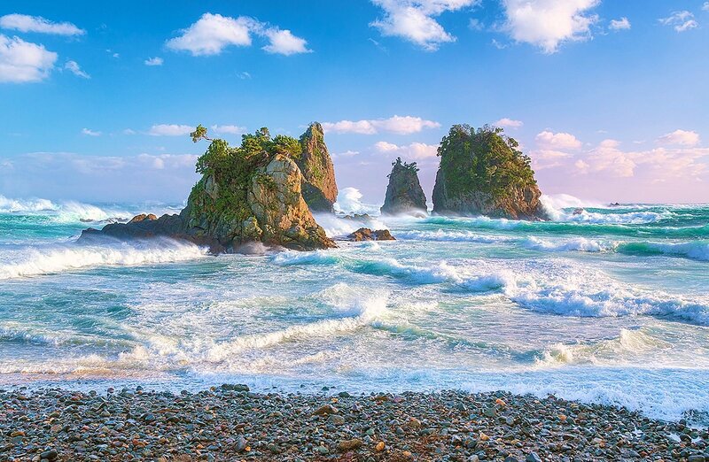 Rocky Islets in Ocean — Blue
