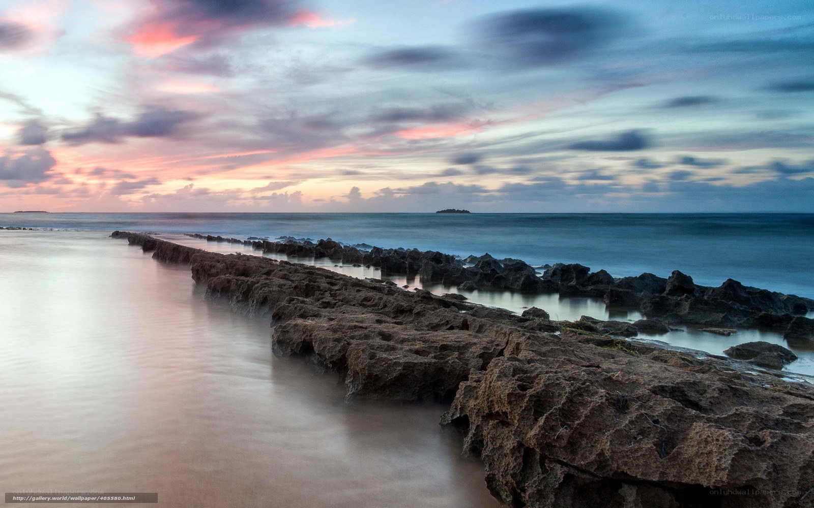 Rocky jetty at sunset