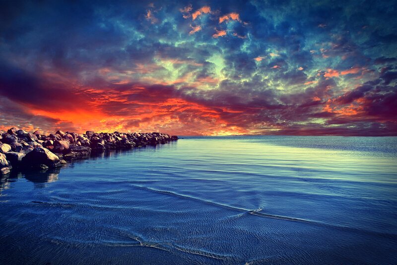 Rocky Jetty at Sunset — Blue