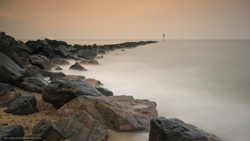 Rocky Jetty at Sunset — Orange, Serene