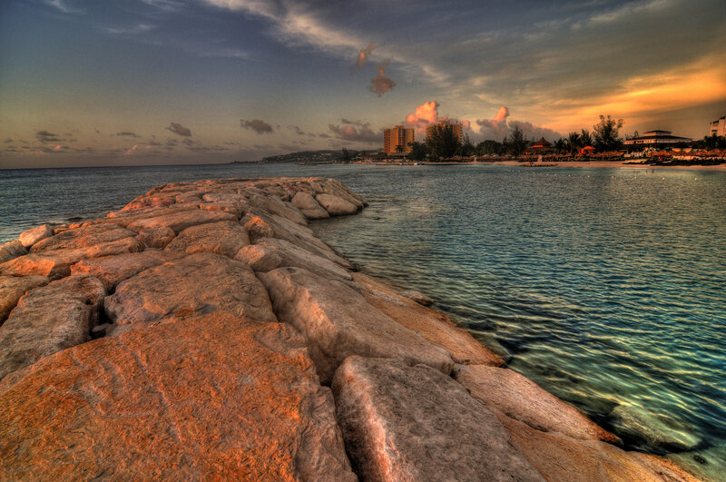 Rocky Jetty at Sunset — Orange