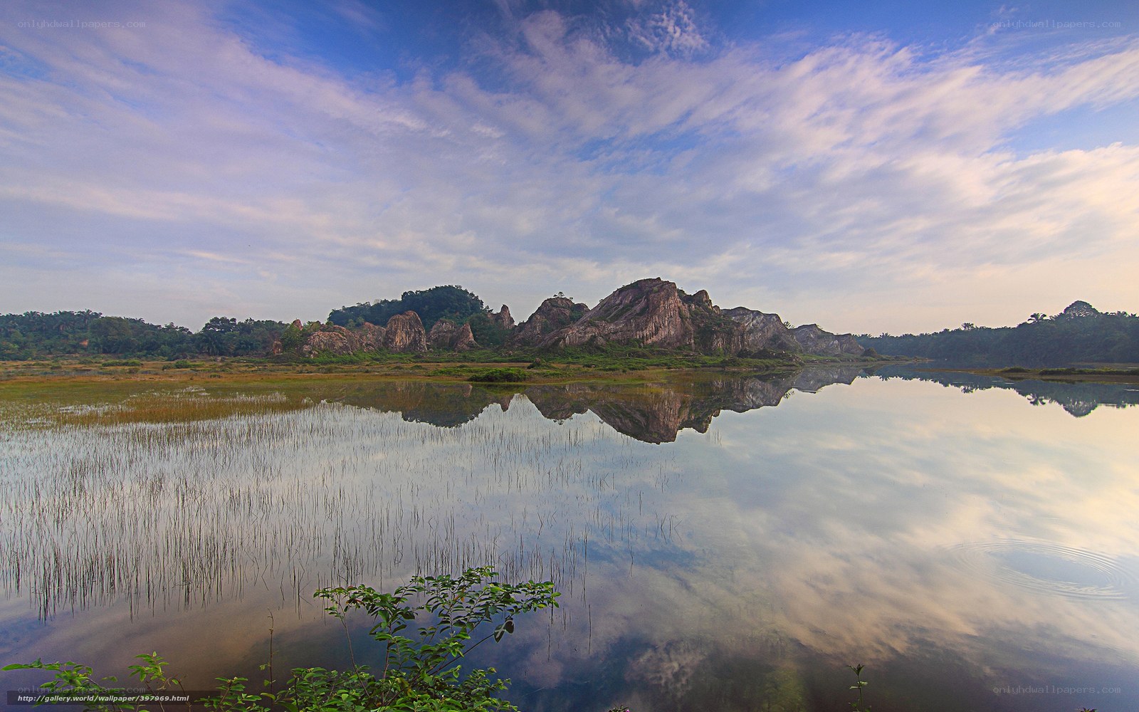 Rocky landscape reflected in calm water