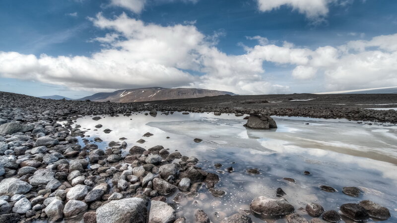 Rocky Landscape with Pond