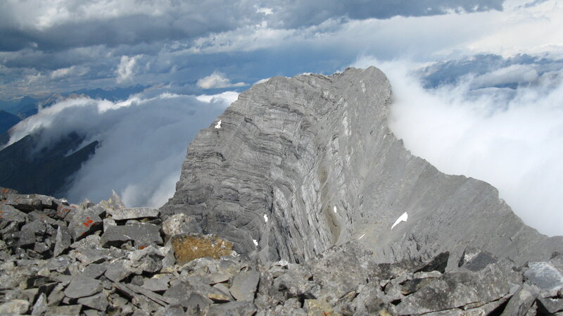 Rocky Mountain Peak — Gray, Dramatic, Photograph, Clouds, Rocks