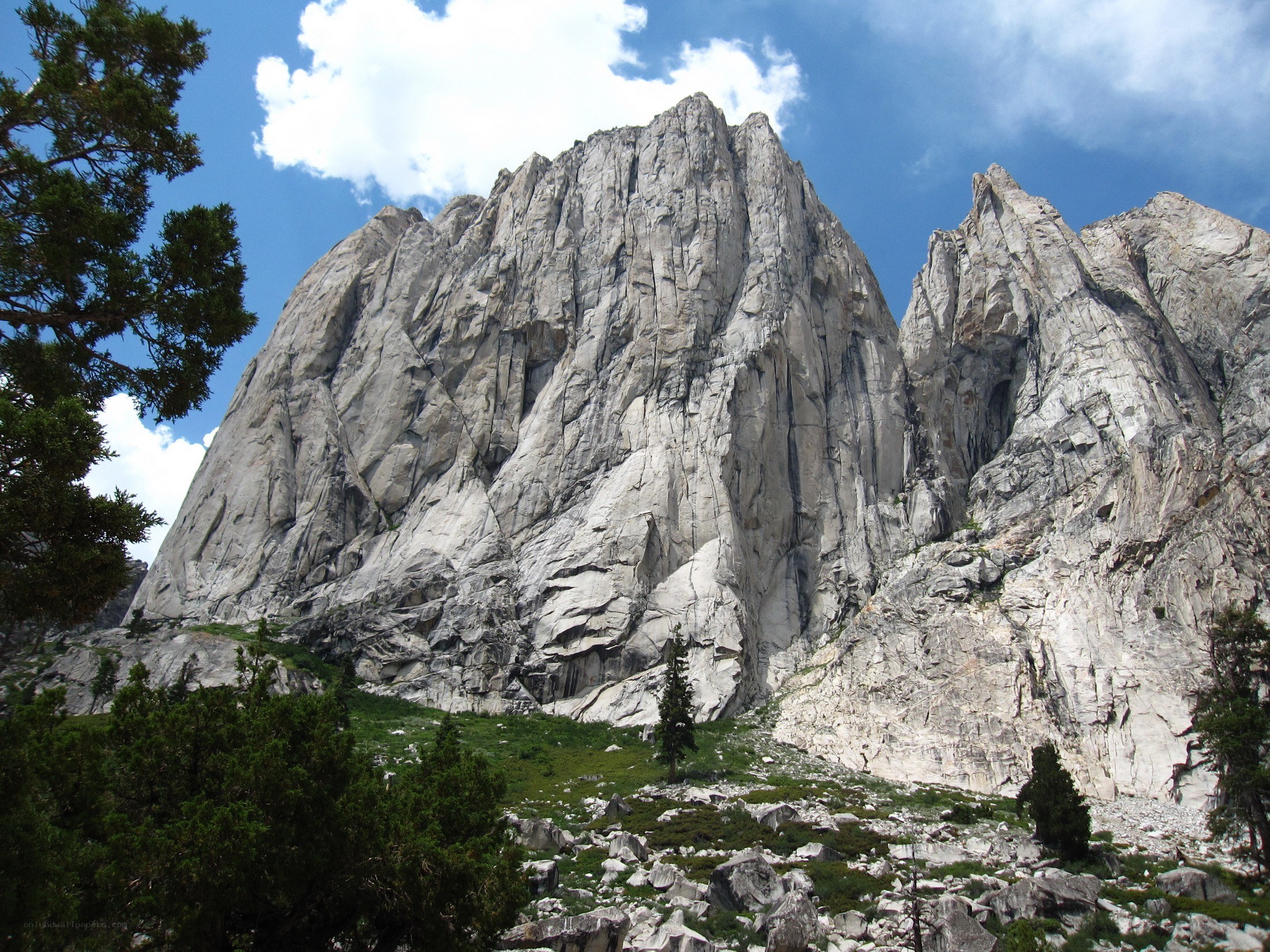 Rocky mountain peak under blue sky