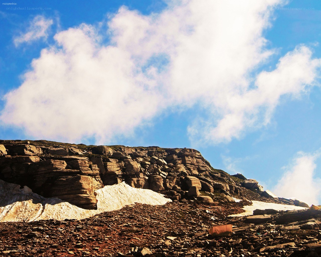 Rocky mountain peak with snow