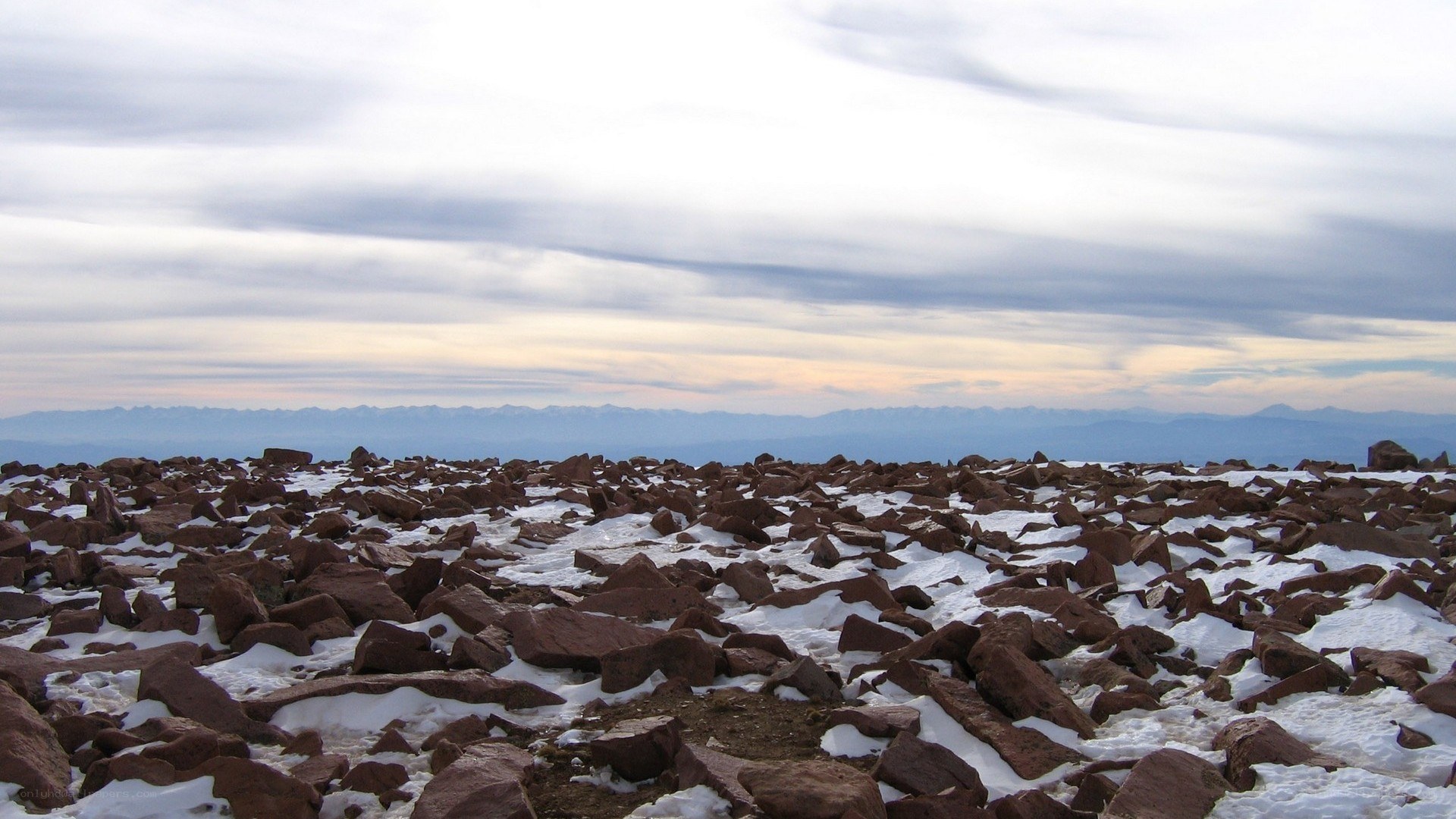Rocky mountain summit with snow