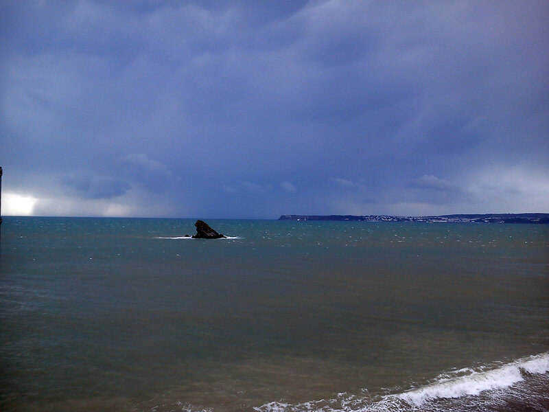 Rocky Outcrop in Sea — Blue, Dramatic