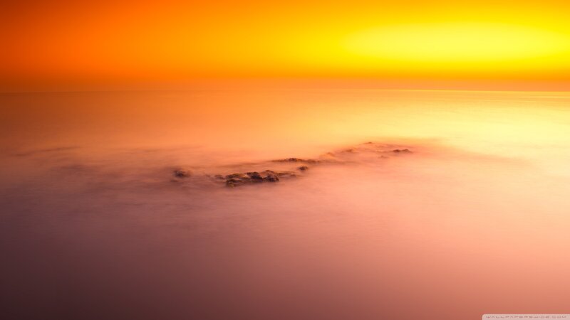 Rocky Outcrop in Sea — Orange, Serene, Sunset