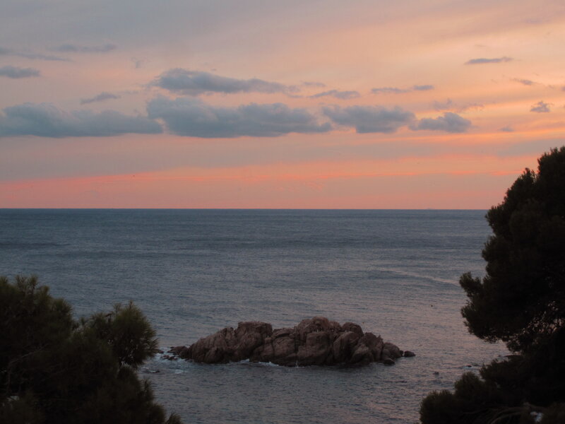 Rocky Outcrop in Sea — Orange