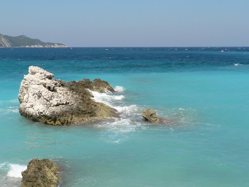 Rocky outcrop in turquoise sea