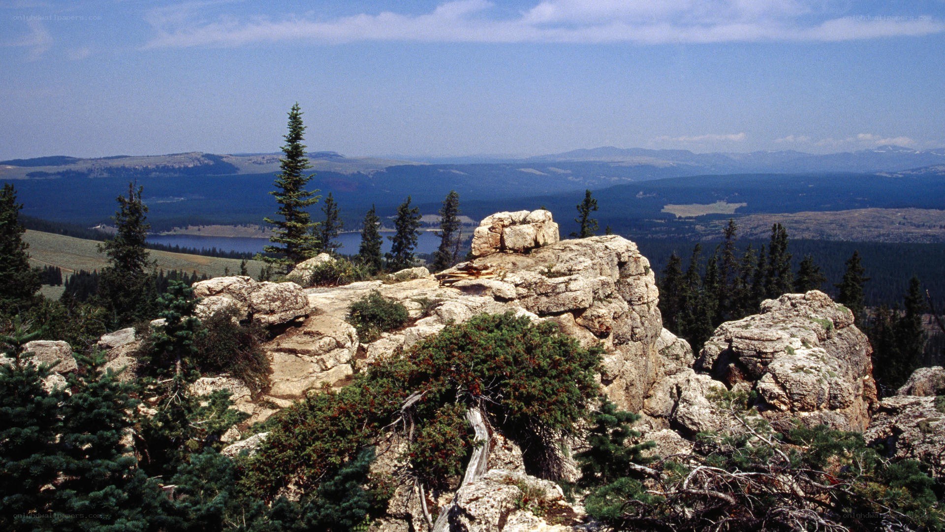 rocky outcrop overlooking a lake