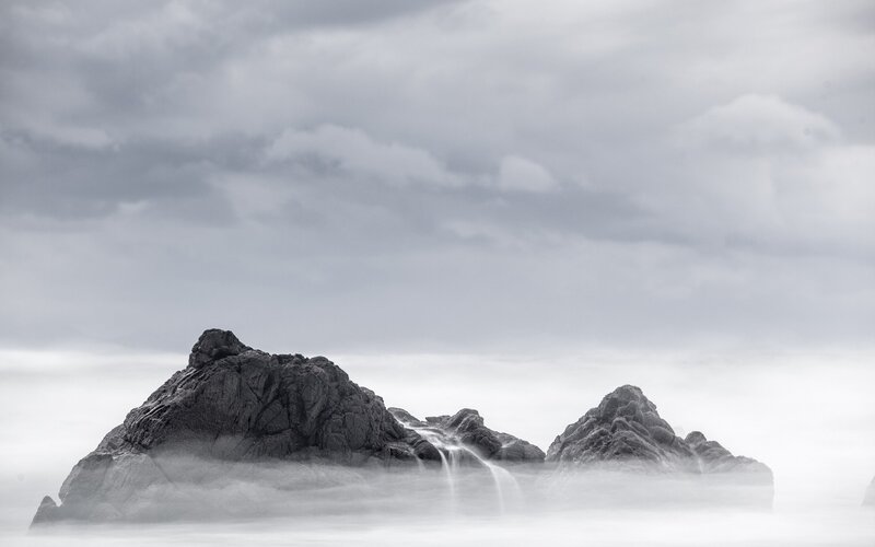 Rocky outcrops in mist