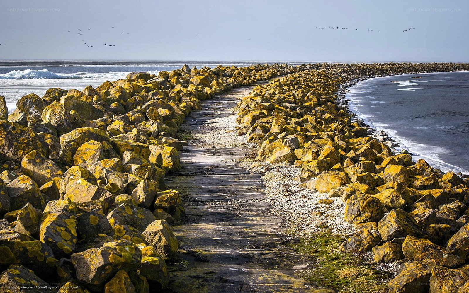 Rocky path on a coastal breakwater