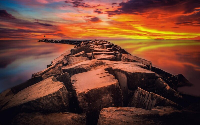 Rocky Pier at Sunset — Orange