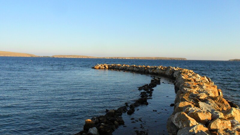 Rocky pier at sunset